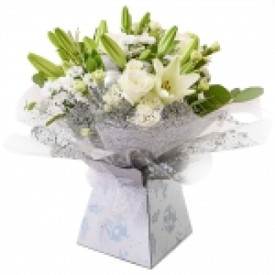 AVA - A creamy selection of blossoming buds in shades of white, complimented by greenery and carefully hand-tied. Beautifully presented, only the perkiest petals make up this creation. Include a message for that personal touch. 

*Fine Print: Every bouquet is hand made and delivered by the local florist. Pictures shown are recent examples of an actual arrangement that were designed by talented florists and later sent out to a customer just like you! Please note that each individual florist cannot guarantee what the flower varieties or colours will be, they do guarantee that your specific arrangement will be fresh, beautiful and that your recipient will love it!